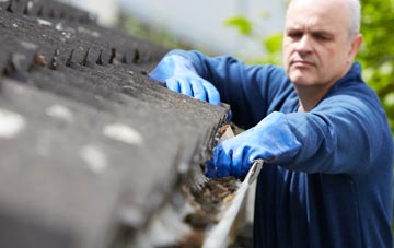 cleaning and inspecting Stone Street roofs